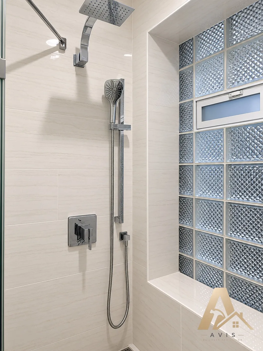 Walk-in shower with a rain shower head, handheld shower, and glass block window